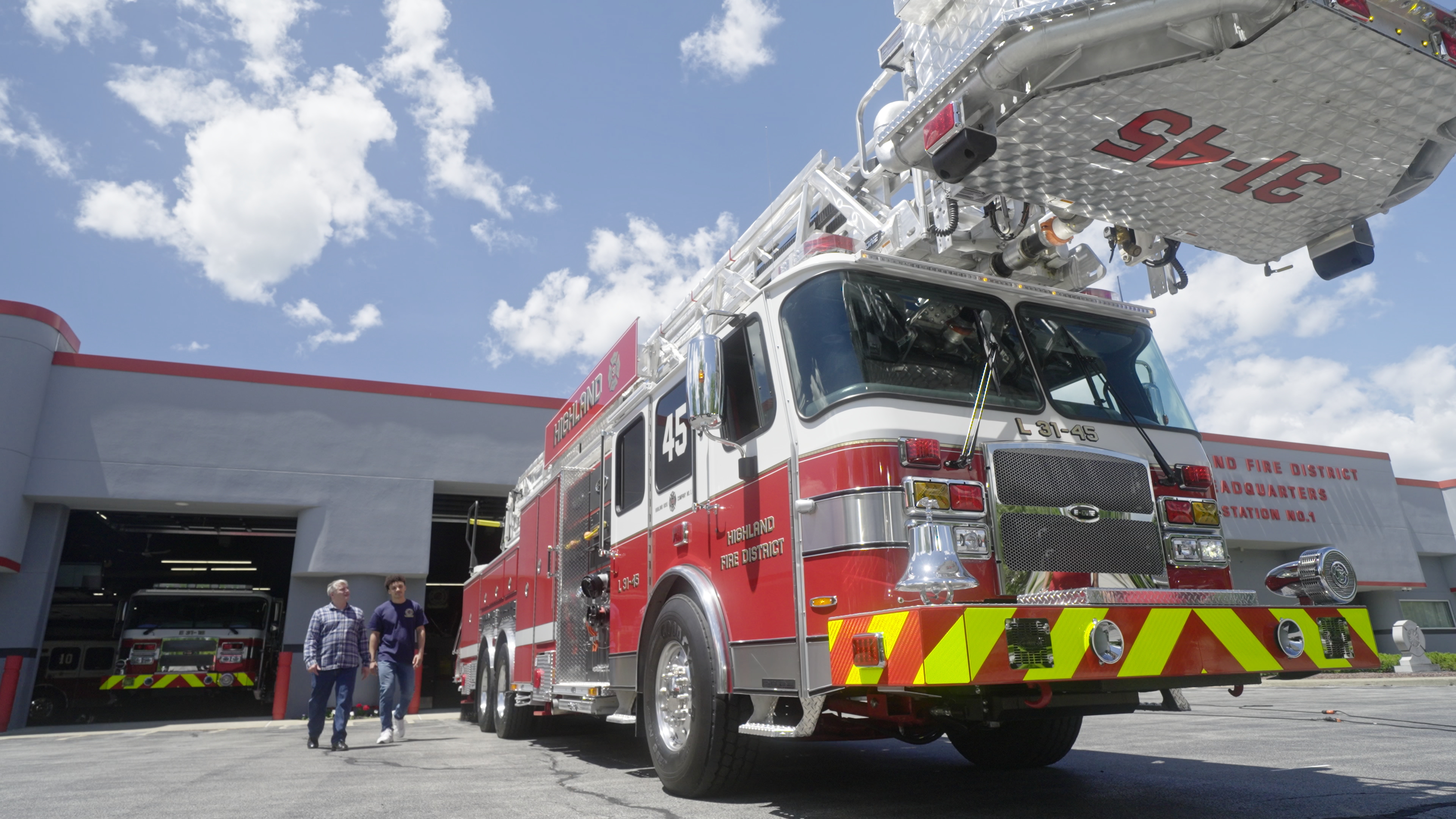RIDE WITH US - Rick overcomes his fear of heights and takes a ride in the aerial ladder truck bucket.